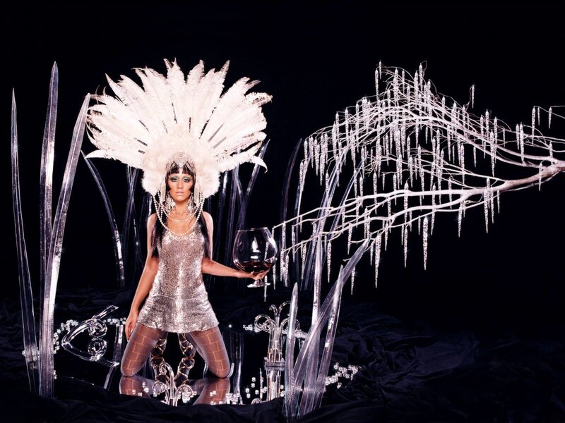 woman in feathered headdress