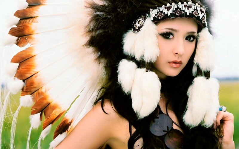 woman in feathered headdress