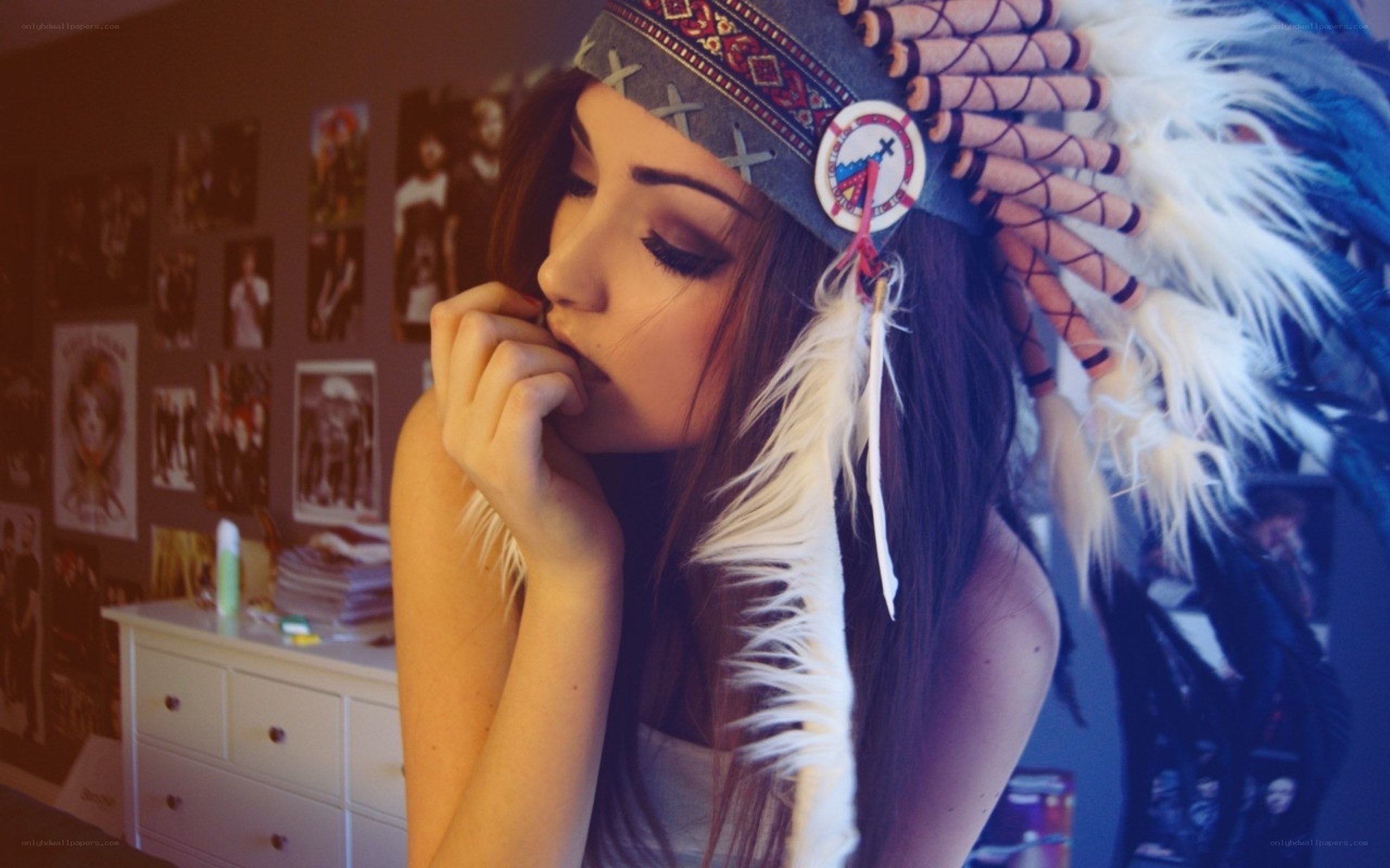 woman in feathered headdress