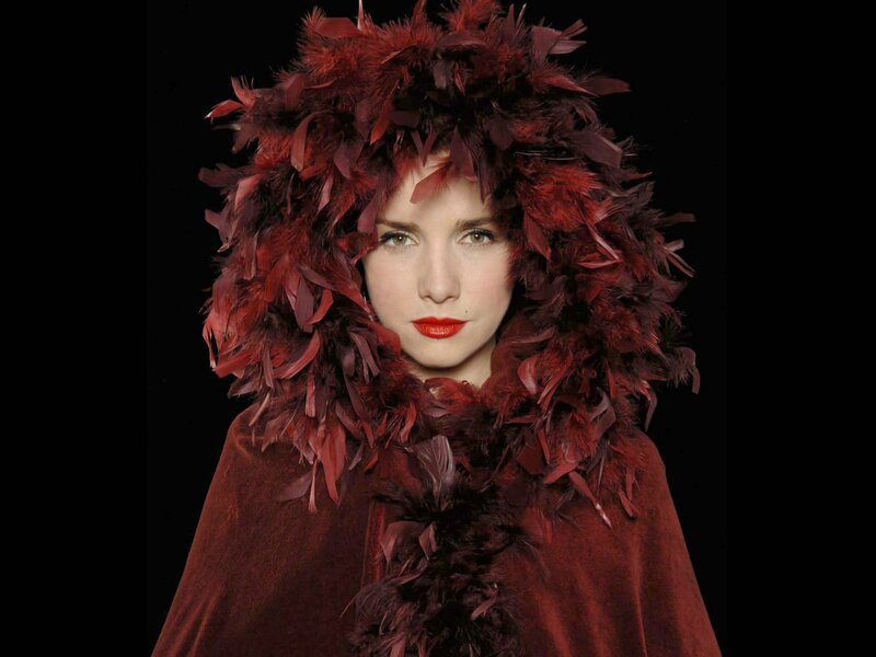 Woman in Feathered Hood