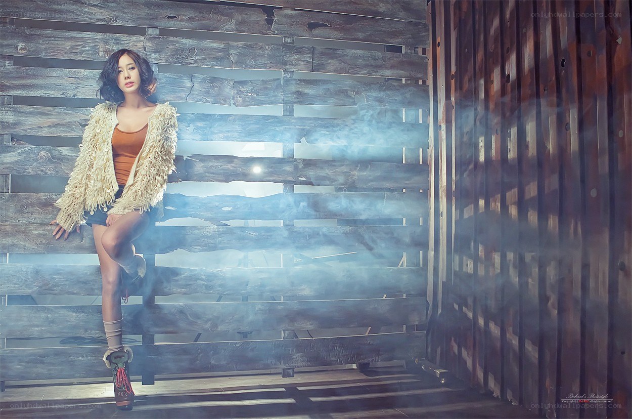 woman in feathered jacket