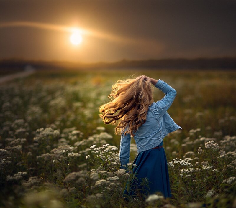 Woman in Field at Sunset — Blue