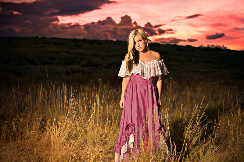 Woman in Field at Sunset — Purple