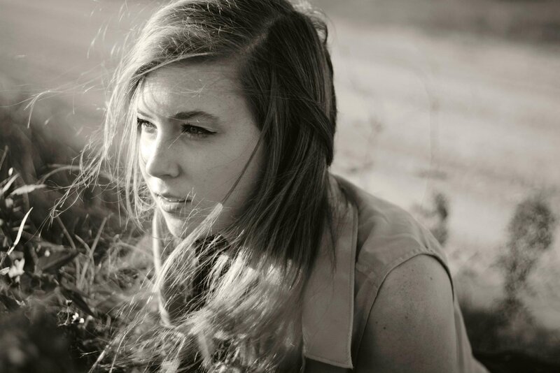 Woman in Field — Black, Contemplative, Afternoon, Photograph