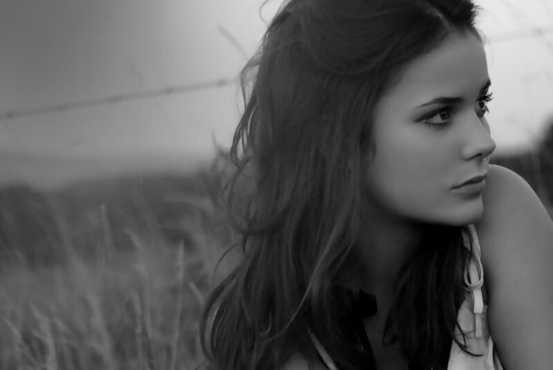 Woman in Field — Black, Contemplative