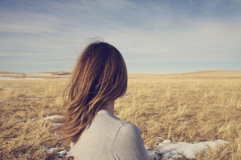Woman in Field — Brown, Serene, Winter