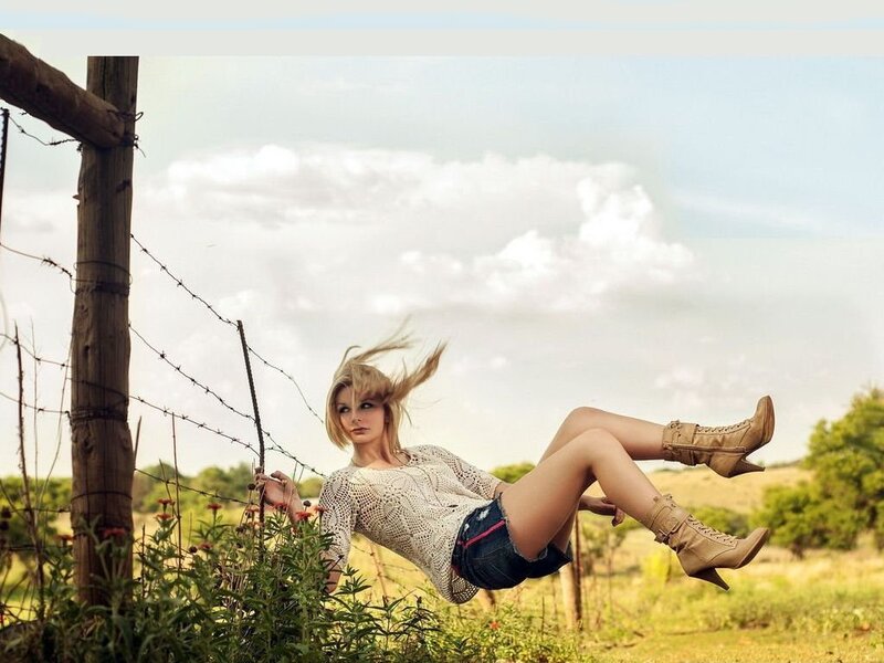 Woman in Field — Green, Dramatic, Afternoon, Photograph, Barbed Wire