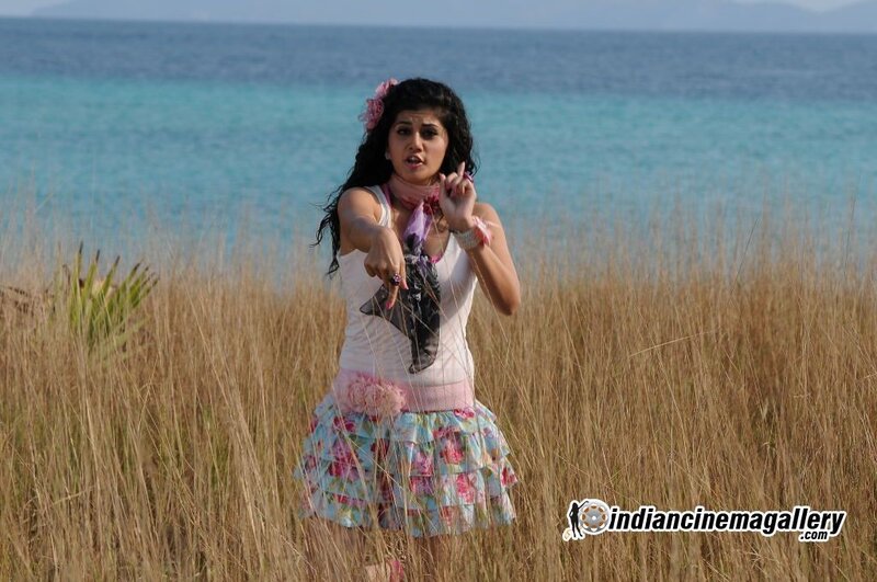 Woman in Field Near Ocean