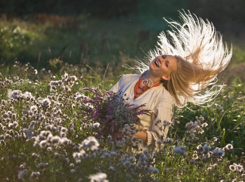 Woman in Field of Flowers — White
