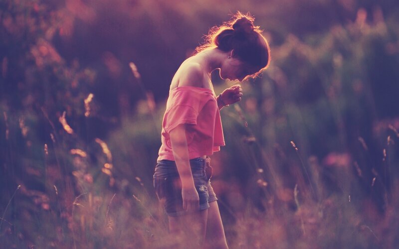 Woman in Field — Pink, Contemplative