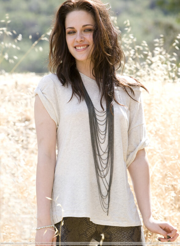 woman in field smiling
