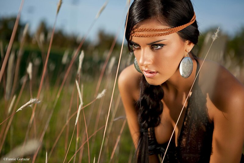 woman in field with braided headband