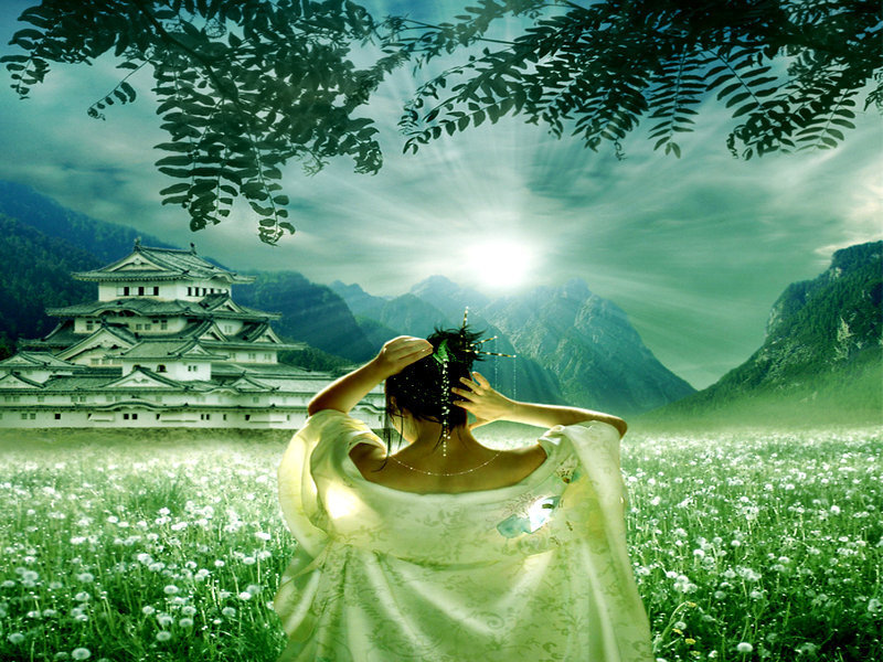 Woman in field with castle