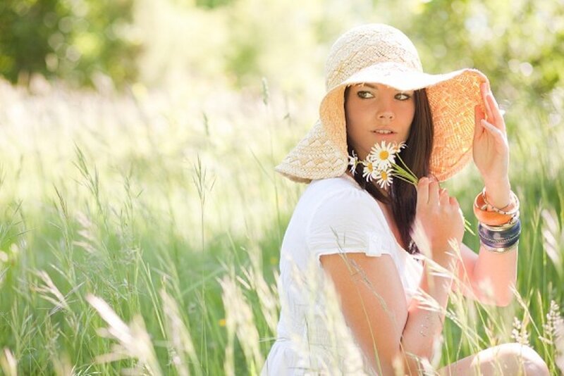 Woman in Field with Daisies