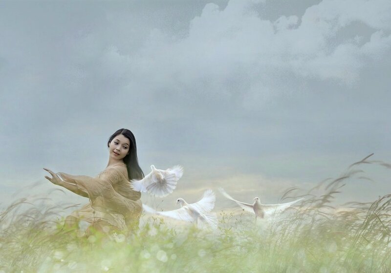 Woman in Field with Doves