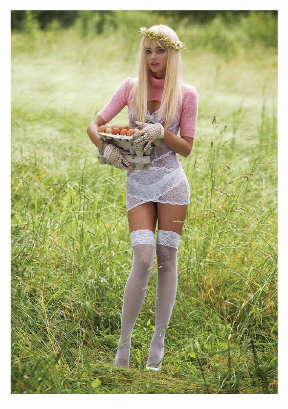 Woman in field with eggs