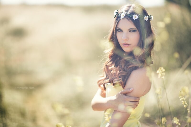 woman in field with flower crown