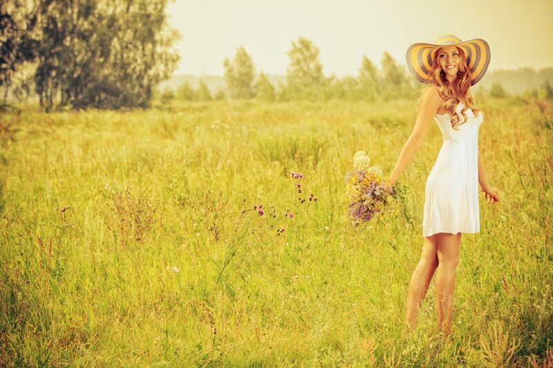 Woman in Field with Flowers — Yellow