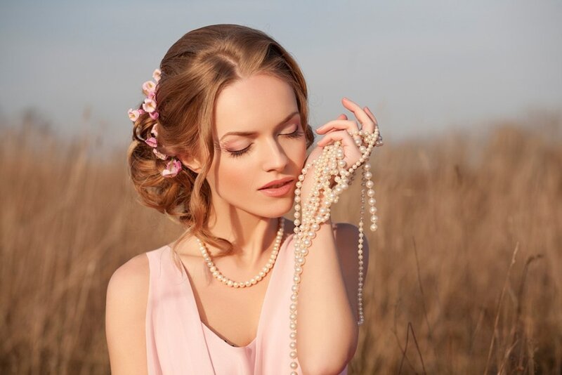 Woman in Field with Pearls