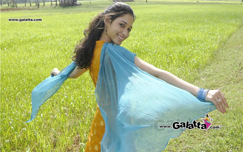 woman in field with scarf