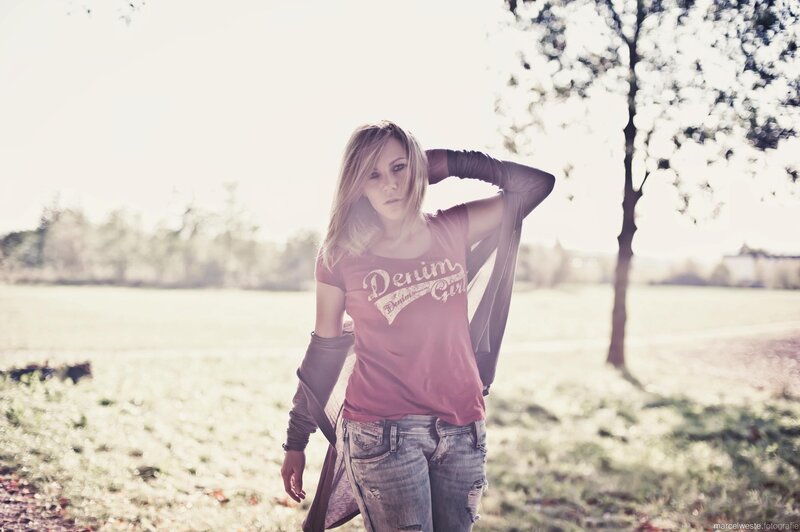 Woman in field with t-shirt