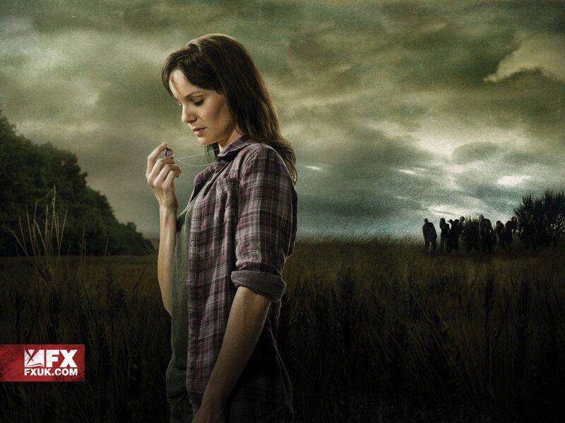 Woman in field with zombies