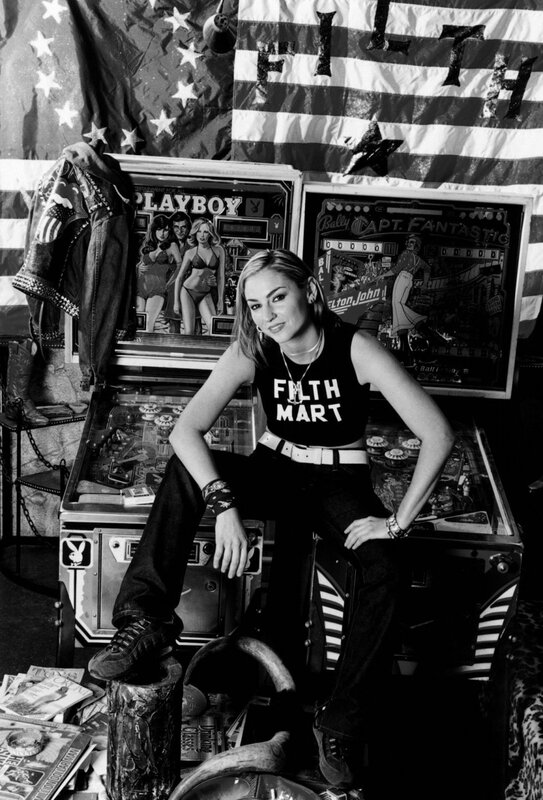 Woman in Filth Mart shirt