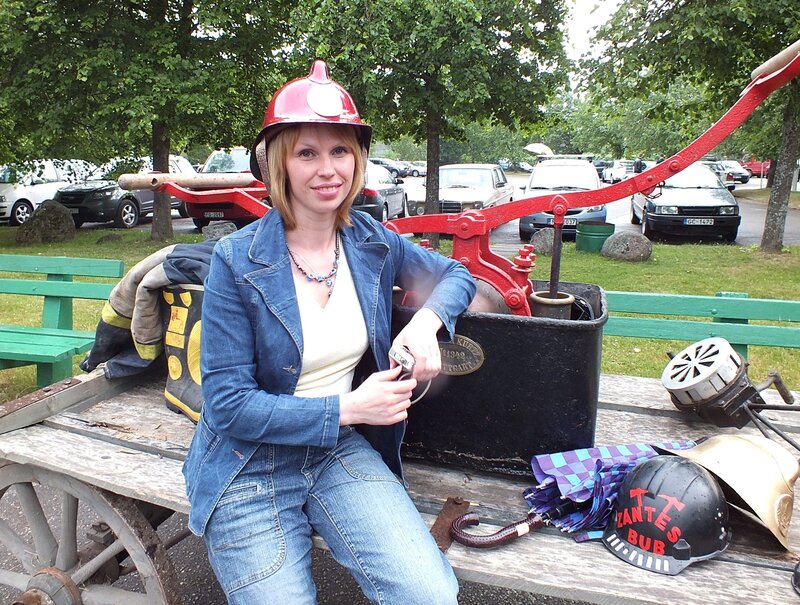 Woman in Firefighter Helmet
