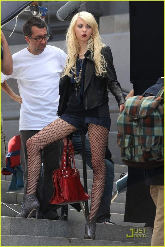 woman in fishnet stockings on set