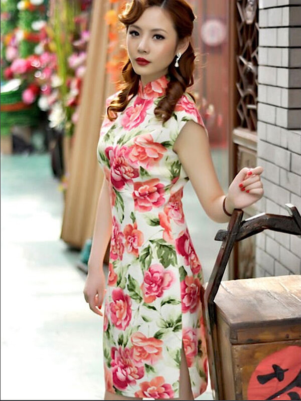 Woman in floral cheongsam dress
