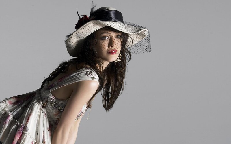 woman in floral dress and hat