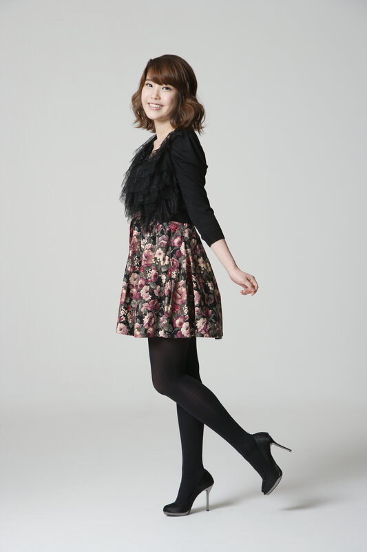 woman in floral dress and heels