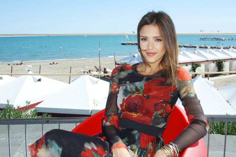 Woman in floral dress at beach