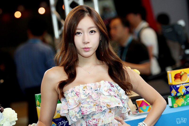 woman in floral dress at event