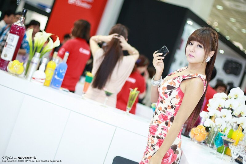 Woman in floral dress at event
