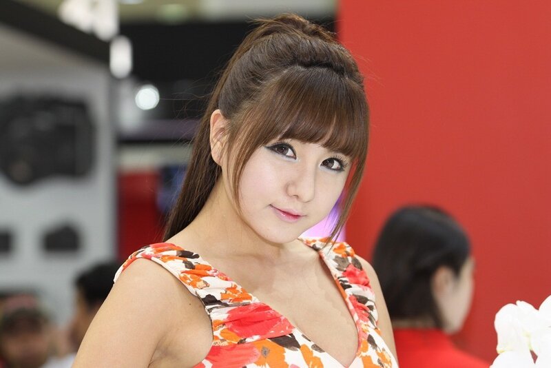 woman in floral dress at event