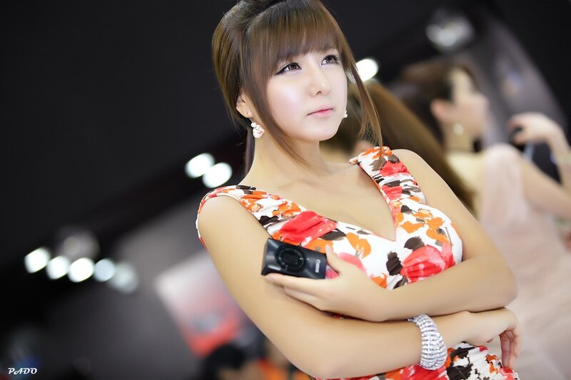 Woman in floral dress at event