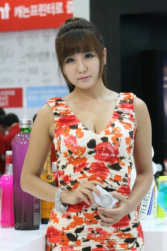Woman in floral dress at event