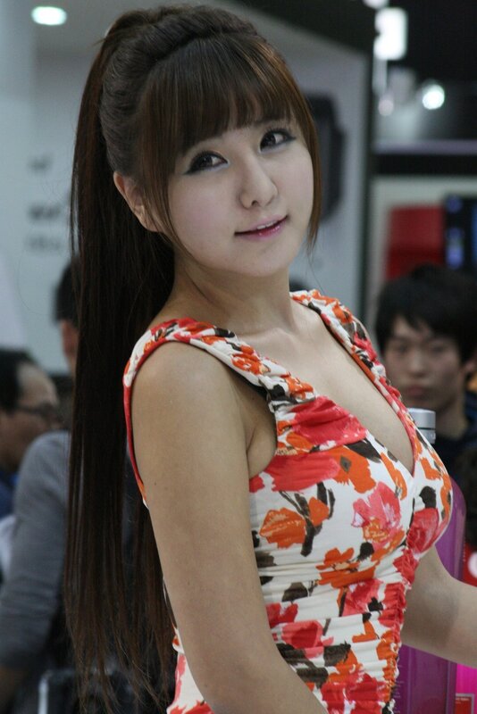 woman in floral dress at event
