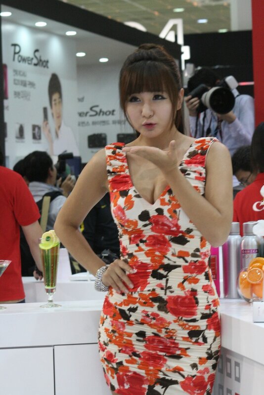 woman in floral dress at event