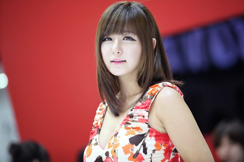 woman in floral dress at event