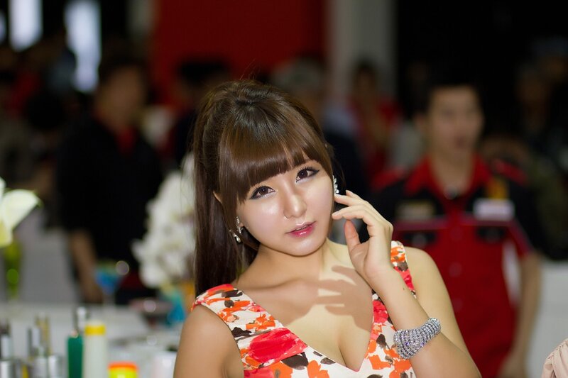 woman in floral dress at event