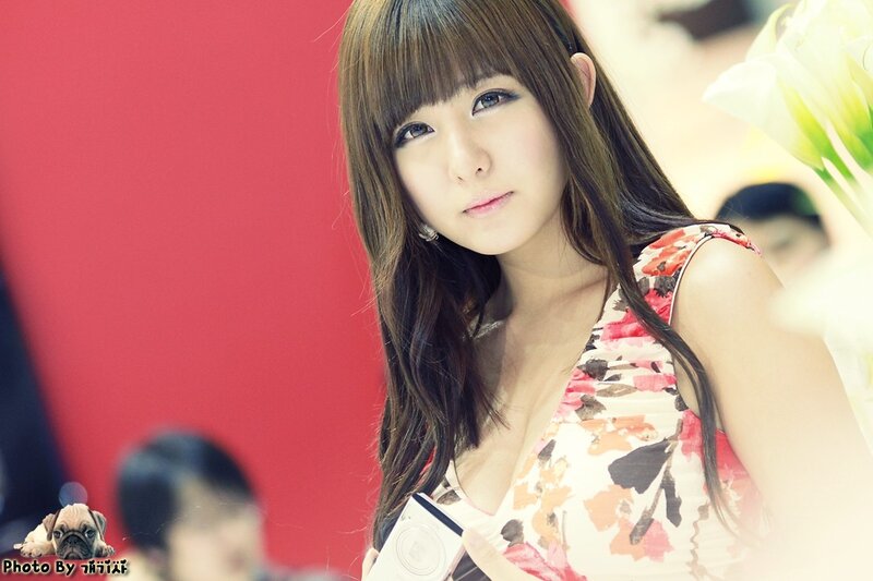 woman in floral dress at event