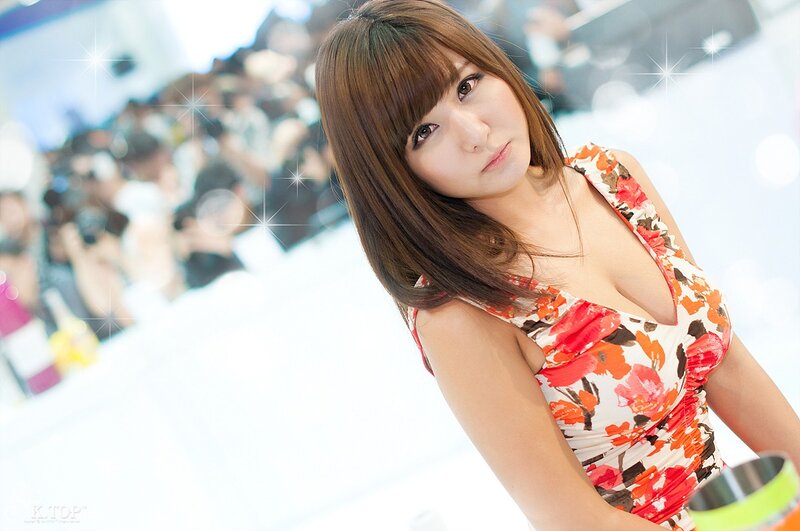 woman in floral dress at event