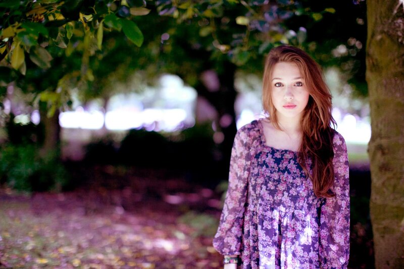 woman in floral dress at night
