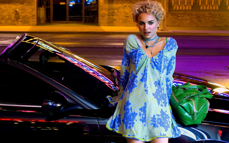 woman in floral dress at night