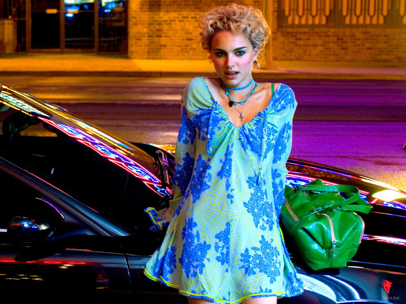 woman in floral dress at night