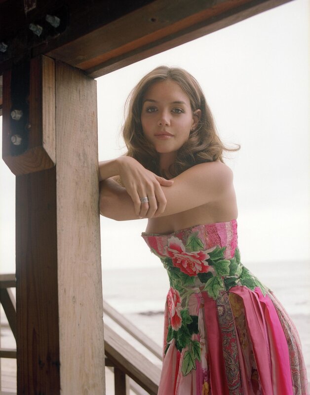 woman in floral dress at pier