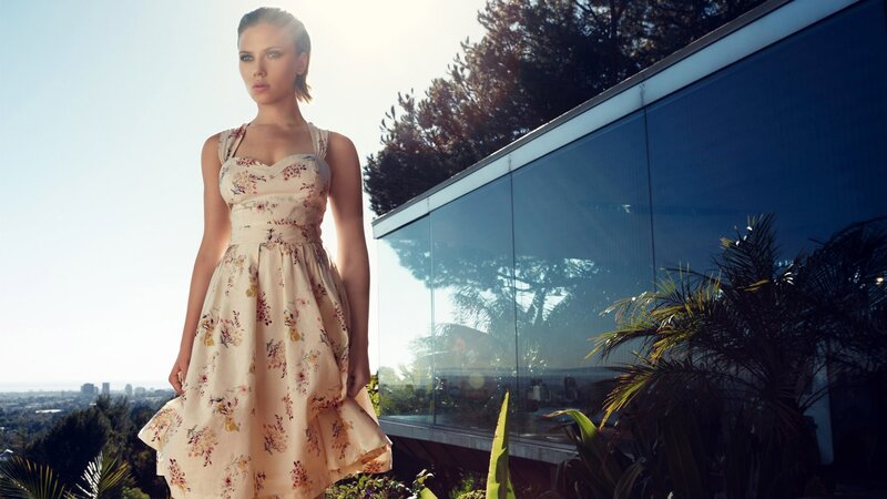 Woman in Floral Dress — Beige, Dramatic, Afternoon, Photograph, Glass Building, Trees, Cityscape
