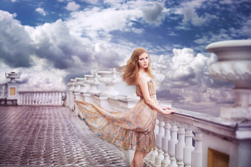 Woman in Floral Dress — Blue, Dramatic, Afternoon, Photograph, Balcony